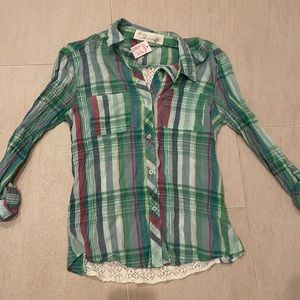 Long sleeve bright colors top.